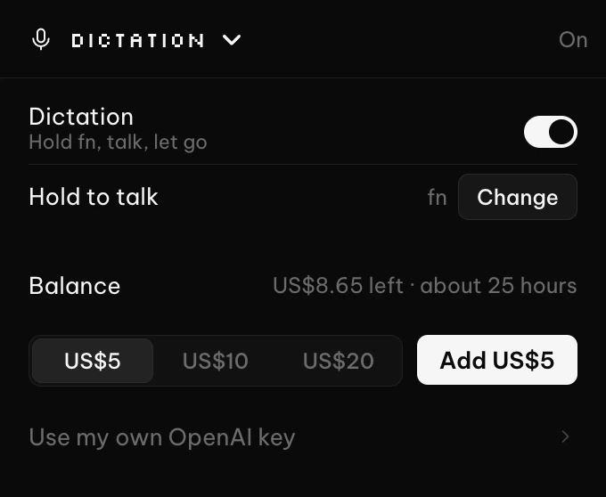 The Dictation panel switched on: the hold key set to fn, the balance and the US$5, US$10 and US$20 top-up picker.